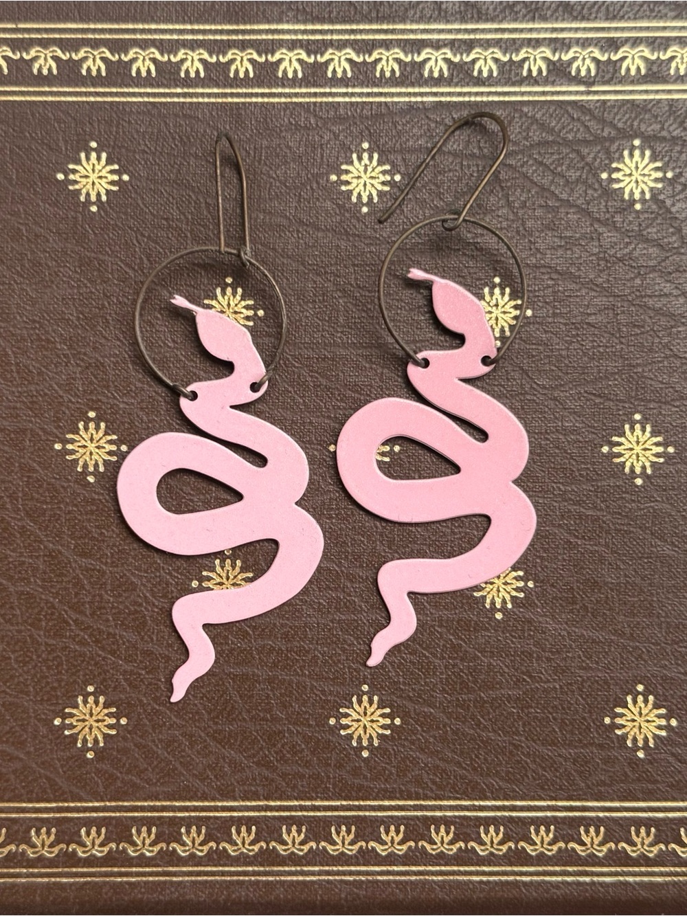 While Odin Sleeps Pink Snaked Earrings